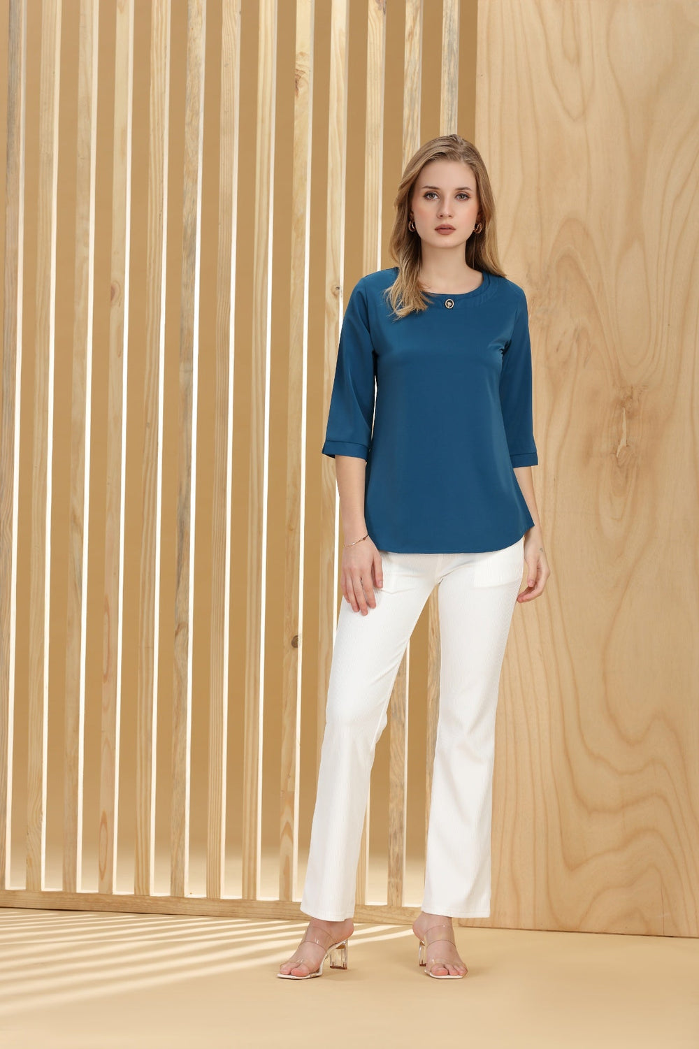 elxsi Peacock TOP
